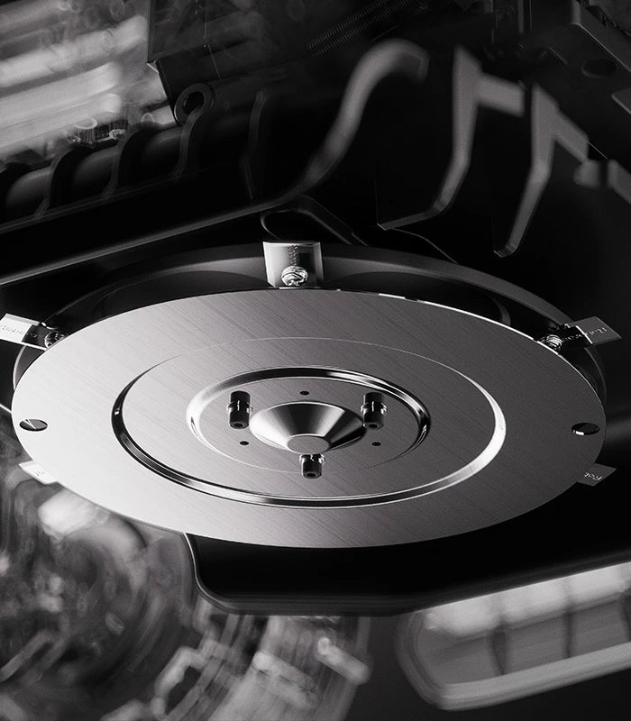 Close-up of the RockMow Z1 robot lawn mower’s cutting disc and six-blade mowing system.
