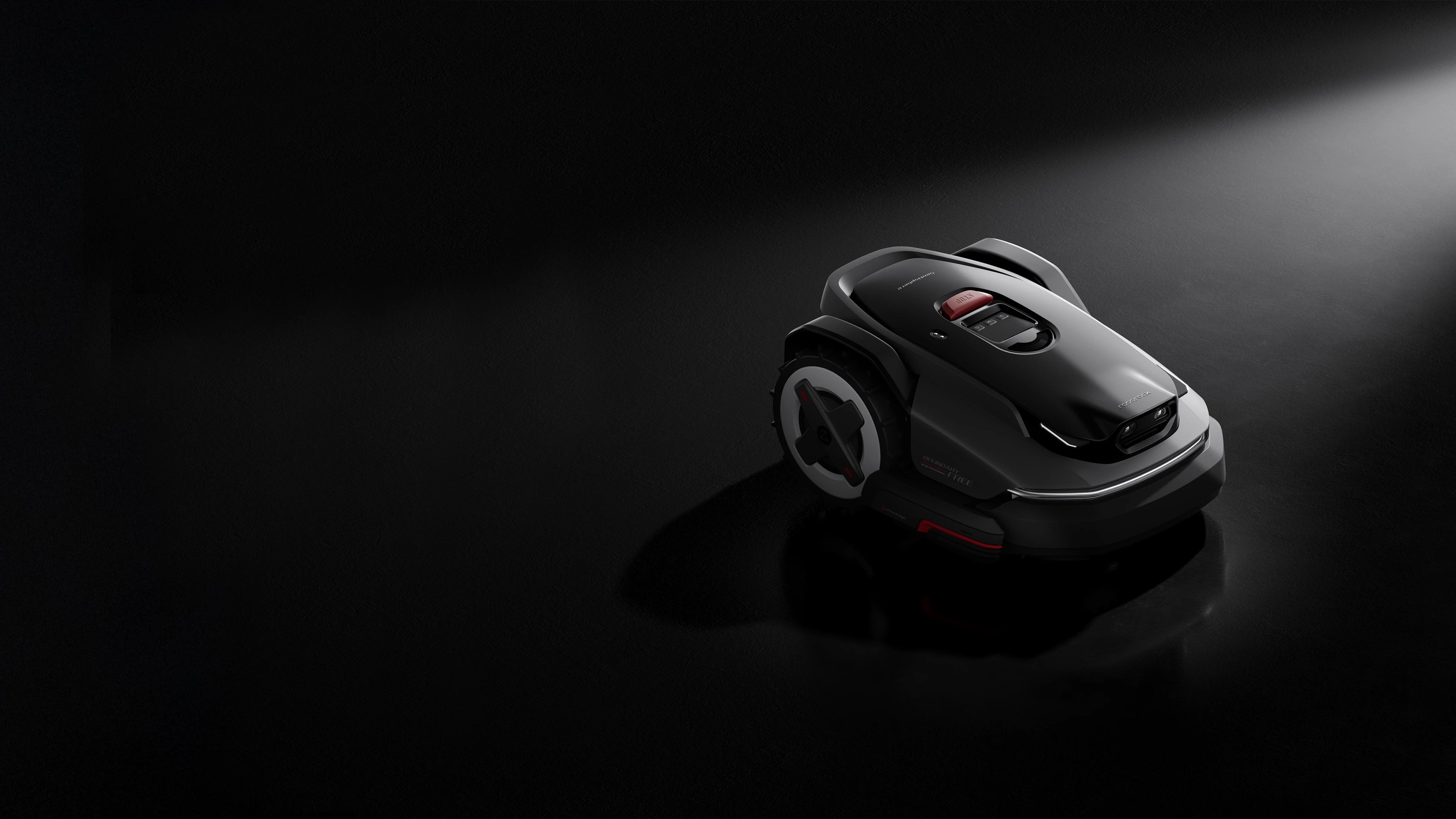 RockMow S1 robotic lawn mower showing low-profile design and front obstacle sensor