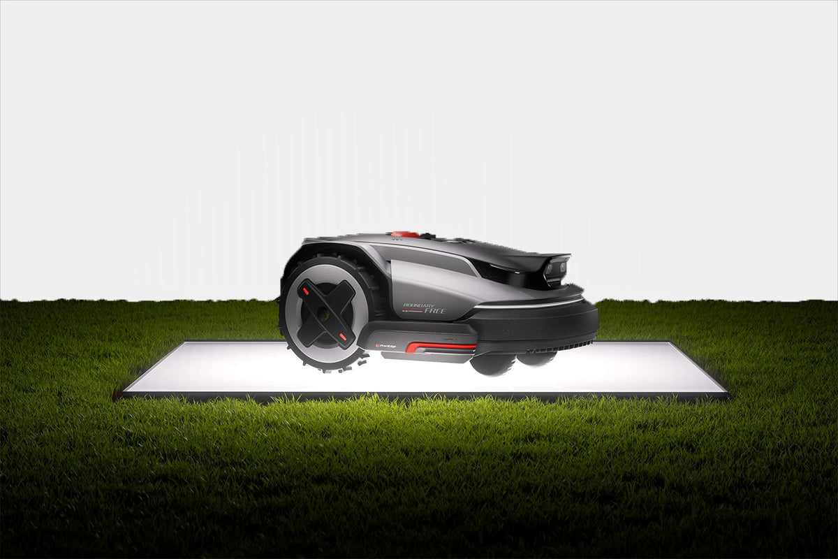 RockMow S1 robotic lawn mower product image showing low-profile design, rear drive wheel and front sensor