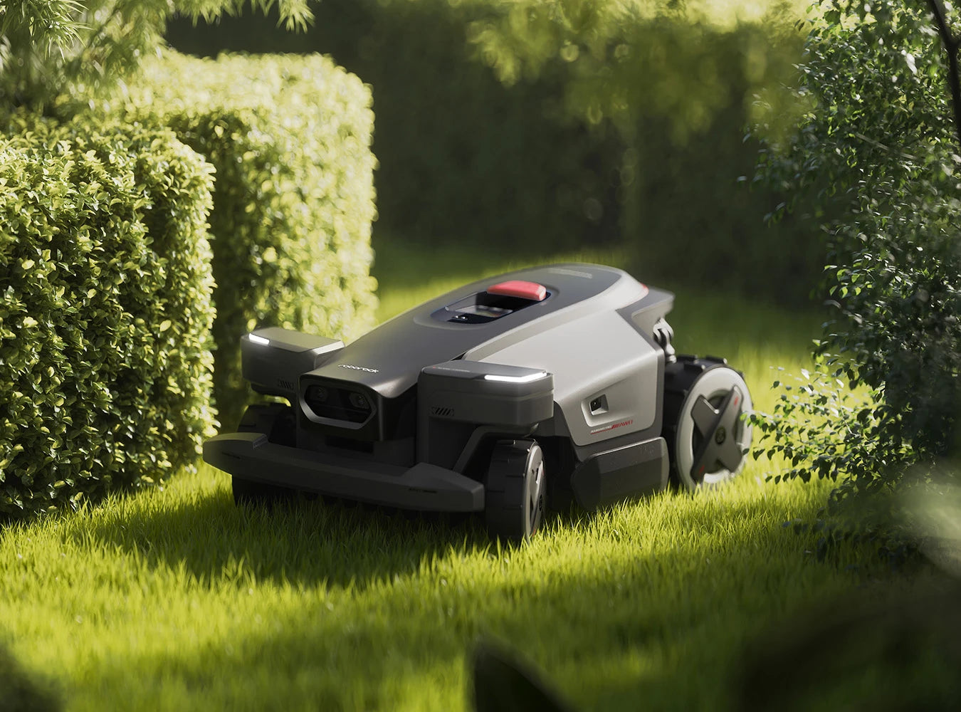 RockMow Z1 robot lawn mower navigating through a narrow garden passage between hedges.