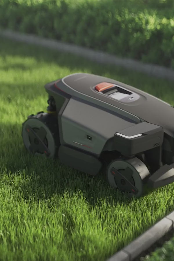 RockMow Z1 robotic lawn mower demonstrating its Active Steering System for controlled, non-scuff movement.